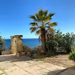 Casa Giunicchi, Un Gioiello Fronte Mare Tatil Evi Portoscuso